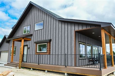 grey house black metal roof|gray siding black windows.